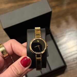 Elegant Movado Gold & Black Watch